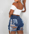 Distressed denim shorts